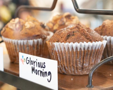 "Glorious morning" sign with muffins