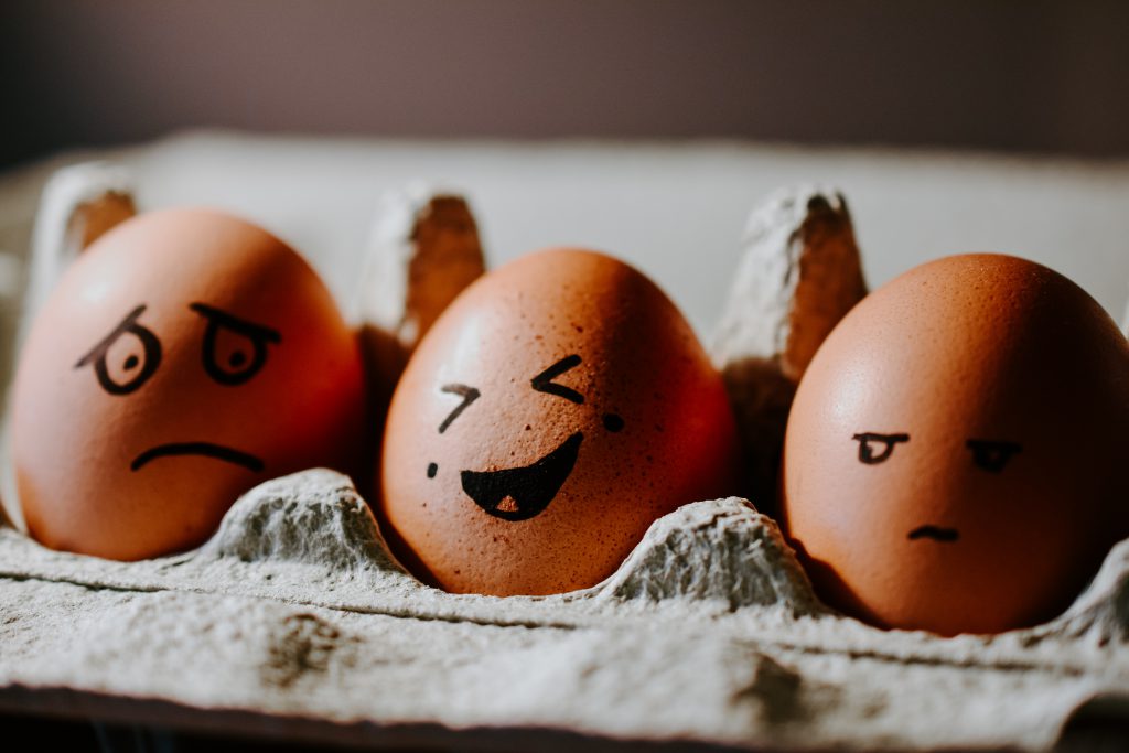 Egg with illustrated laugh