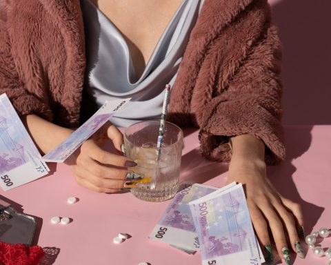 person, pills, liquor, and money