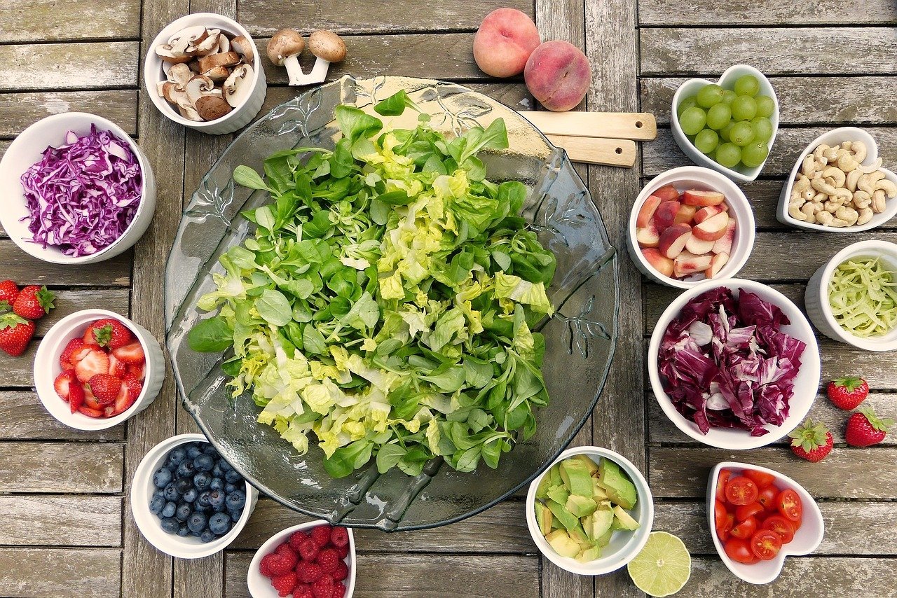 table of salad vegetables and fruit