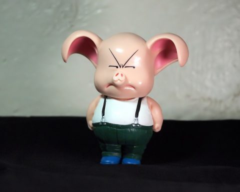 toy pig with a scowl on its face